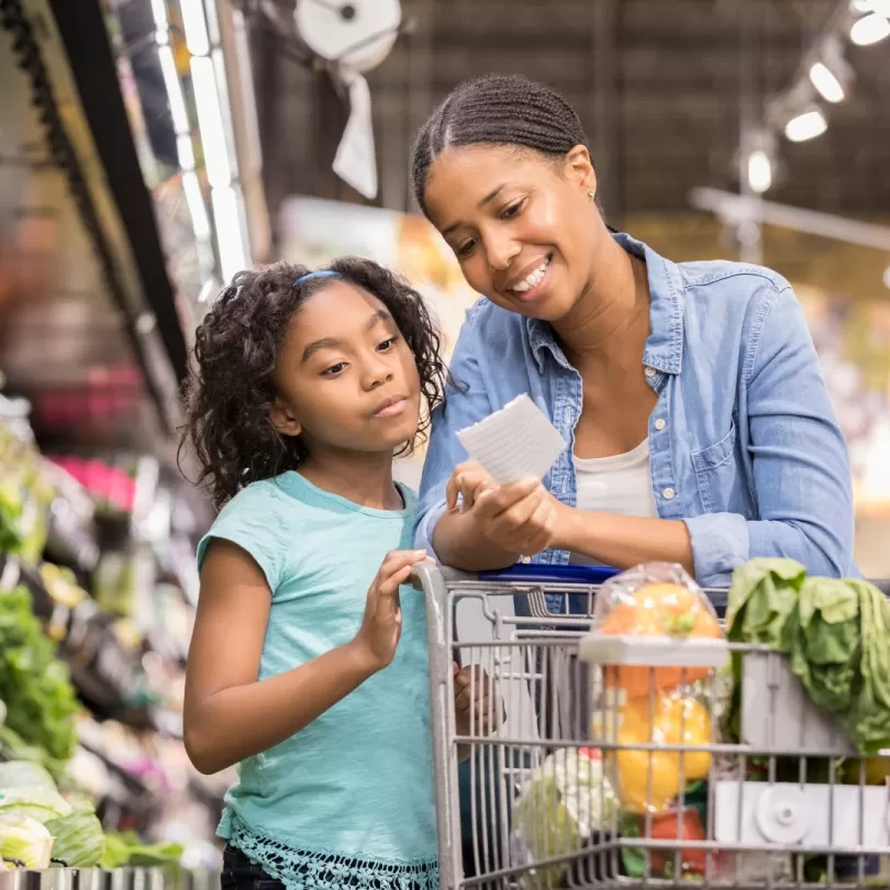 Mother and daughter grocery shop