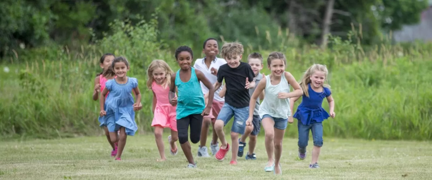 Kids running in field